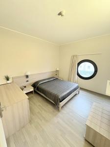 Posteľ alebo postele v izbe v ubytovaní Hotel Meuble' Atlantic