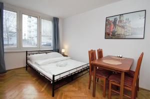Postel nebo postele na pokoji v ubytování roomspoznan po - Pokoje Kazimierza Wiekiego - 24h self check-in + 10 fotografií