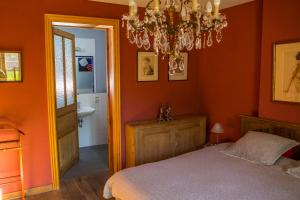 Postel nebo postele na pokoji v ubytování B&B Chez tante Alice
