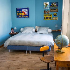 Postel nebo postele na pokoji v ubytování B&B Chez tante Alice