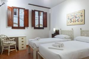 Posteľ alebo postele v izbe v ubytovaní Bargello Apartment