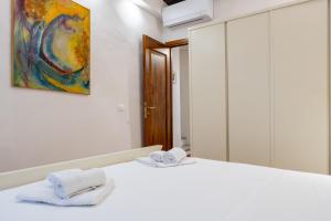 Posteľ alebo postele v izbe v ubytovaní Bargello Apartment