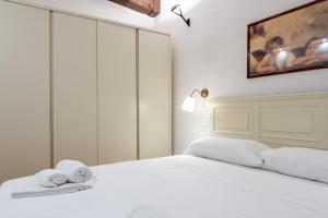 Posteľ alebo postele v izbe v ubytovaní Bargello Apartment