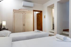 Posteľ alebo postele v izbe v ubytovaní Bargello Apartment