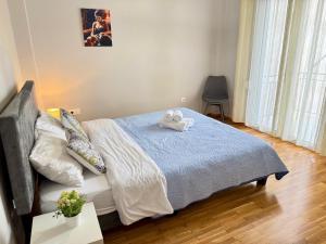 Katil atau katil-katil dalam bilik di Athens Platonos Appartment