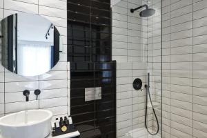 Koupelna v ubytování Cozy Suites Potos + 21 fotografií