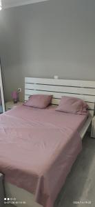 Postel nebo postele na pokoji v ubytování Loukas House 2