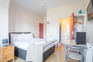 Rasa Sayang House - Self-check-in guesthouse客房内的一张或多张床位