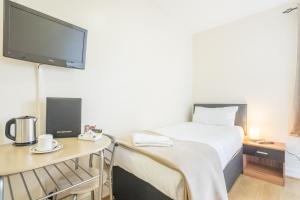 Rasa Sayang House - Self-check-in guesthouse客房内的一张或多张床位