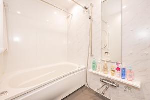 Vonios kambarys apgyvendinimo įstaigoje 鵜の木民宿202号室鵜の木駅から徒歩4分とても便利の場所