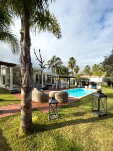 The swimming pool at or close to T Villa