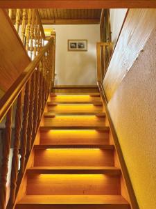 a stairway with wooden steps and a wooden wall at Nicole in Quedlinburg +16 photos