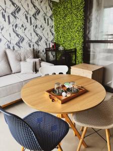 Posezení v ubytování Studio Moderno no Centro - Check-in Digital e Wi-Fi Rápido
