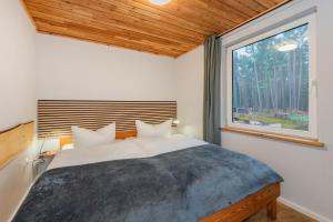 Postel nebo postele na pokoji v ubytování Seestern