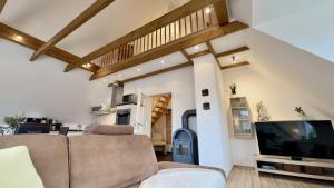 TV a/nebo společenská místnost v ubytování FeWo Harlebriese - Carolinensiel