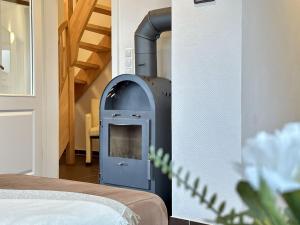 Postel nebo postele na pokoji v ubytování FeWo Harlebriese - Carolinensiel