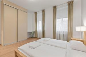 Posteľ alebo postele v izbe v ubytovaní The Capital Retreat Apart