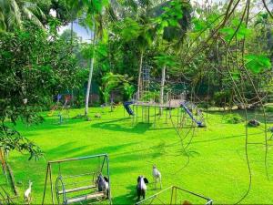 a group of animals standing in a park at Sisiliyana Stone Resort in Gonapola