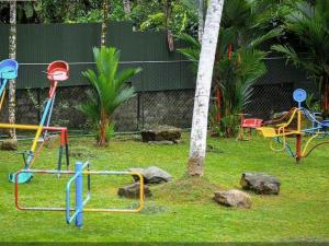 a group of playground equipment in a park at Sisiliyana Stone Resort in Gonapola