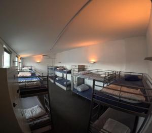 Voodi või voodid majutusasutuse Vitae Hostel toas
