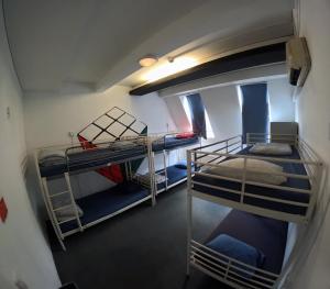 Voodi või voodid majutusasutuse Vitae Hostel toas