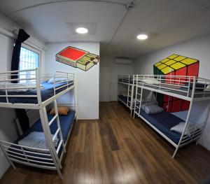 Voodi või voodid majutusasutuse Vitae Hostel toas