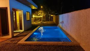 Casa de Praia com Piscina em Maceió - Ipioca - Sauaçuhy内部或周边的泳池