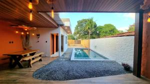 Casa de Praia com Piscina em Maceió - Ipioca - Sauaçuhy内部或周边的泳池