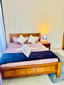 Postel nebo postele na pokoji v ubytování Seriani homes Diani