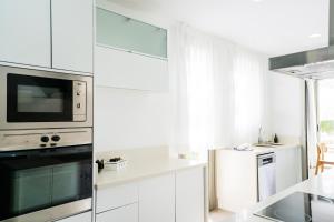 Kuchyň nebo kuchyňský kout v ubytování Coral Villas La Quinta