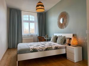 Posteľ alebo postele v izbe v ubytovaní Mint Apart