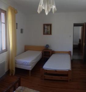 Postel nebo postele na pokoji v ubytování la tute de l'ours