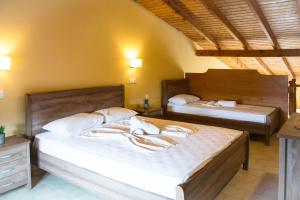 Postel nebo postele na pokoji v ubytování Koulouris Beach Hotel + 35 fotografií