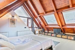 Postel nebo postele na pokoji v ubytování Luderna - Dúplex con terraza Laveja