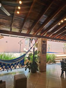 a patio with a hammock in a building at Casa Garay Hotel 658 in Asuncion