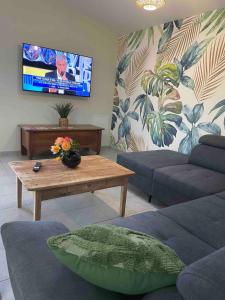 Et opholdsområde på Gîte à la campagne, piscine classé trois-étoiles N2