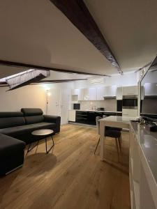 a living room with a couch and a table at Dela in Hvar