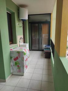 an empty hallway with a room with a room with a door at Casa Marina in Sestu