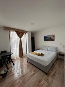 Postel nebo postele na pokoji v ubytování Hotel Royalsun