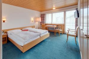 Katil atau katil-katil dalam bilik di Hotel Parnass