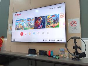 Μια τηλεόραση ή/και κέντρο ψυχαγωγίας στο Austin Crest -- Nintendo, BBQ, Scooter, Spacious - 4BR3B - 10pax by Cowidea