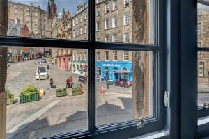 a view from a window of a city street at Warden's Close Apartments in Edinburgh