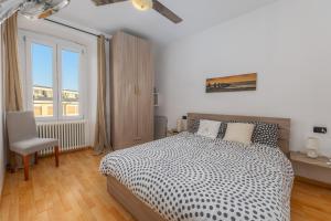 Letto o letti in una camera di TiglioExperienceComo
