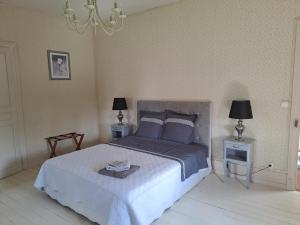 Postel nebo postele na pokoji v ubytování LA Maison DE CARO