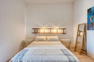 Postel nebo postele na pokoji v ubytování Tenuta Palmira agriturismo