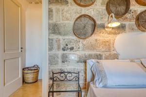 Postel nebo postele na pokoji v ubytování Tenuta Palmira agriturismo