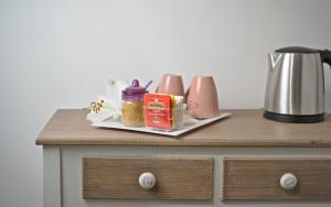 Příslušenství pro přípravu čaje a kávy v ubytování Viale del Colosseo + 25 fotografií