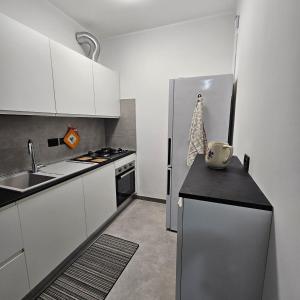 Una cocina o zona de cocina en Appartamento Via Beinette