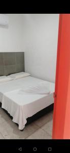 Postel nebo postele na pokoji v ubytování AVENTURa HOTEL