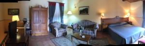 Letto o letti in una camera di Hotel Il Barocco
